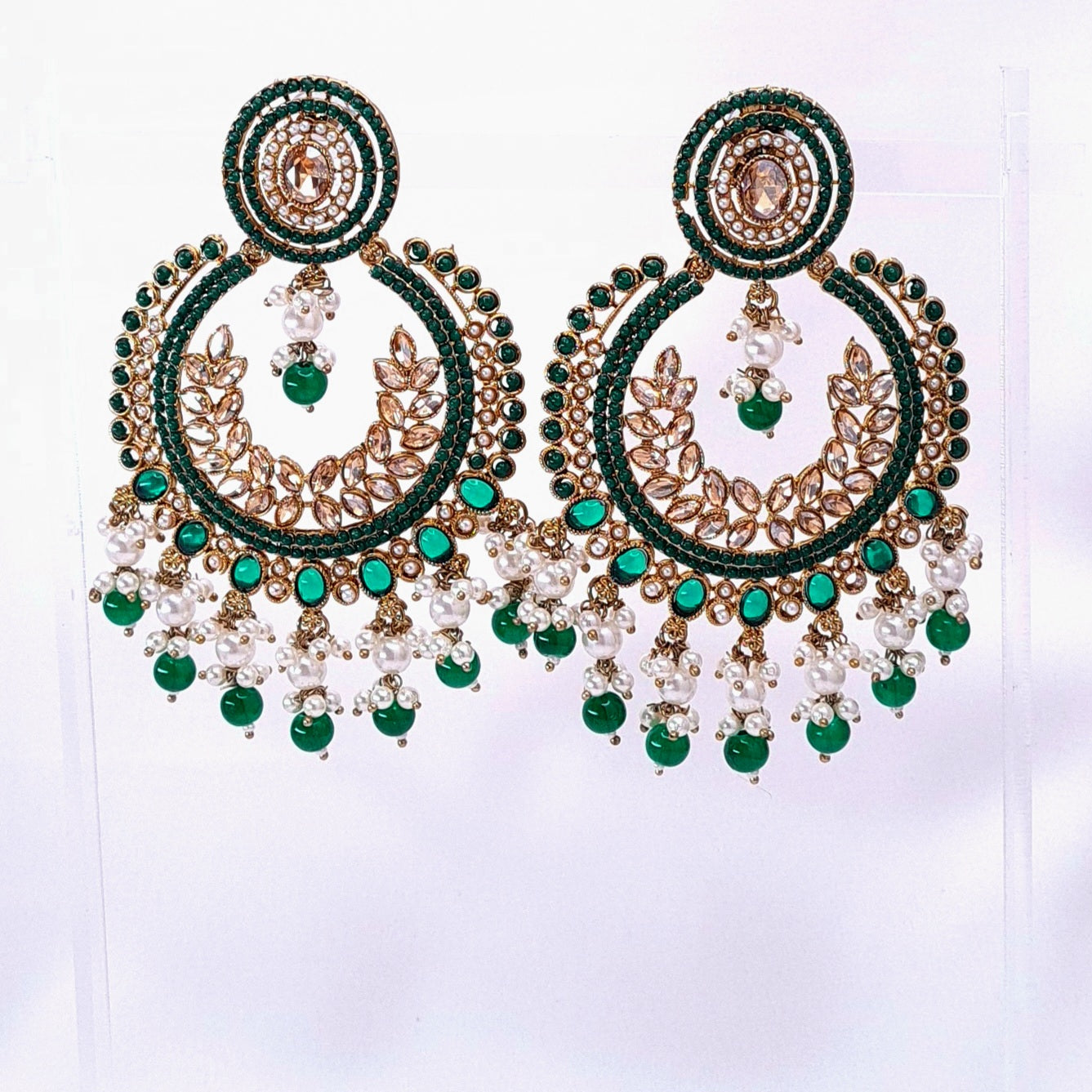 Green and pearl kundan chandbaali earrings with circular design