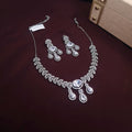 Silver zirconia necklace set with tear-drop and oval-cut stones and matching dangle earrings

