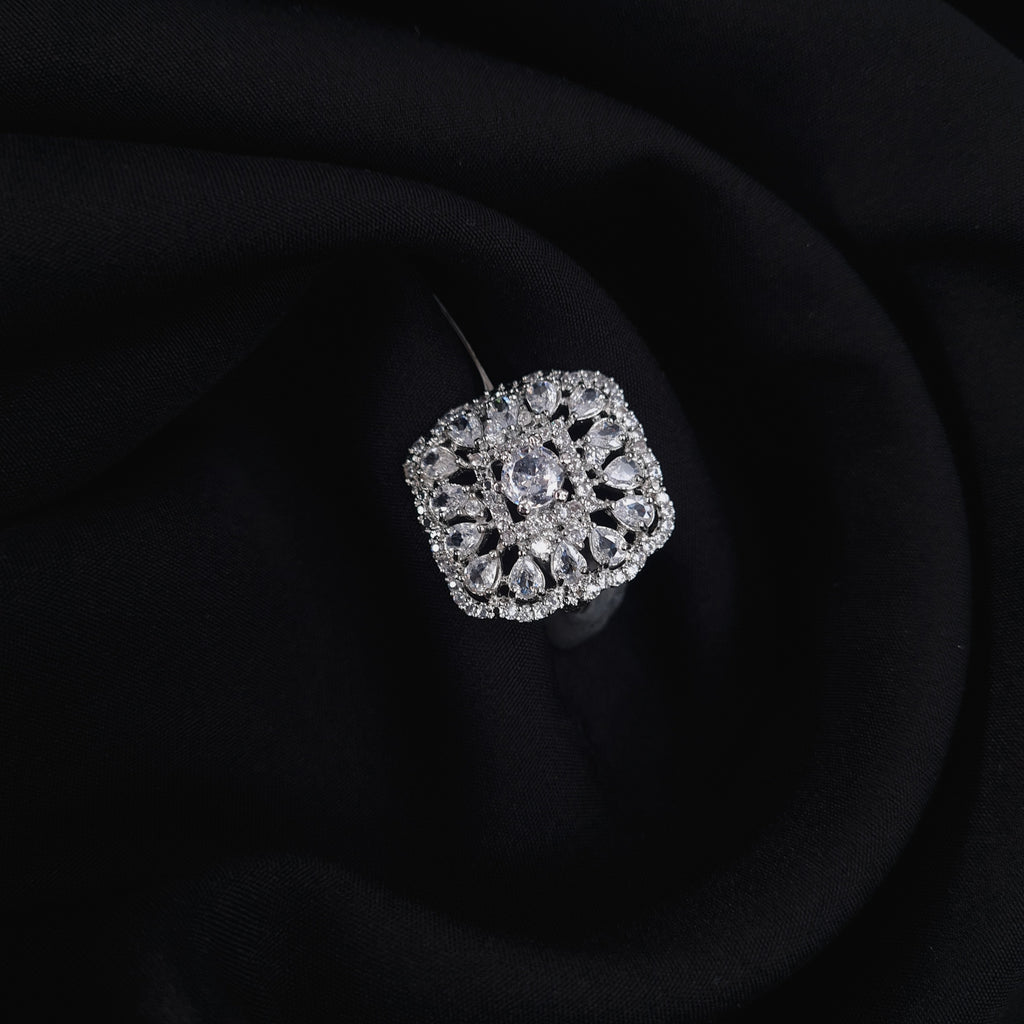 Square silver CZ ring with bold centerpiece and diamond accents