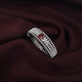 Silver CZ bracelet with red stone and adjustable design

