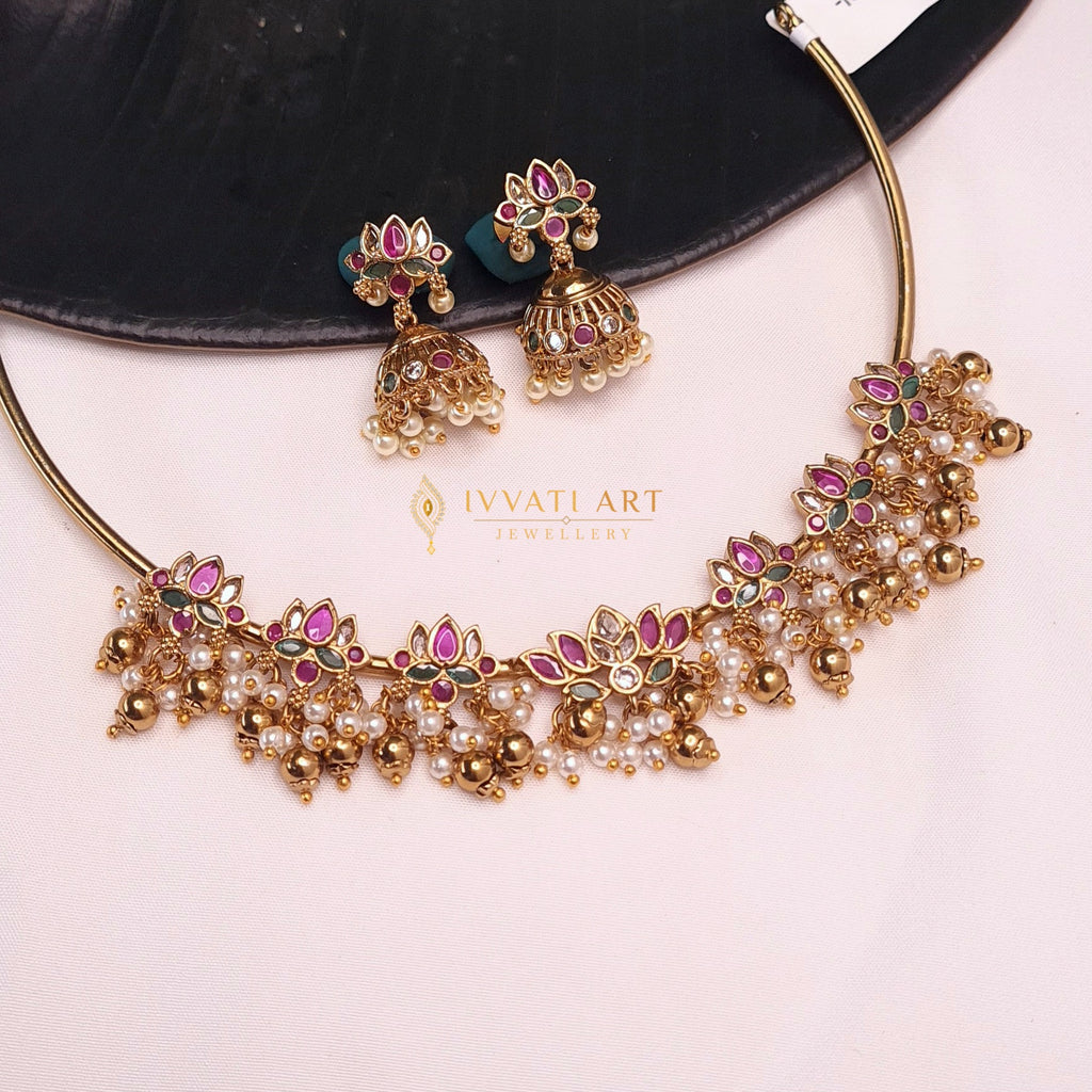 Traditional South Indian copper Adigai necklace with kemp lotus and jhumka

