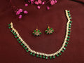 Gold plated CZ necklace with green stone drops and intricate detailing

