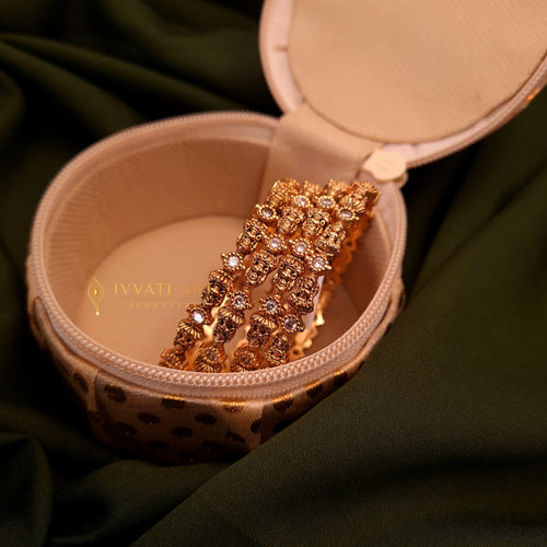 Gold finish floral zircon bangles from Ivvati Art Jewellery 