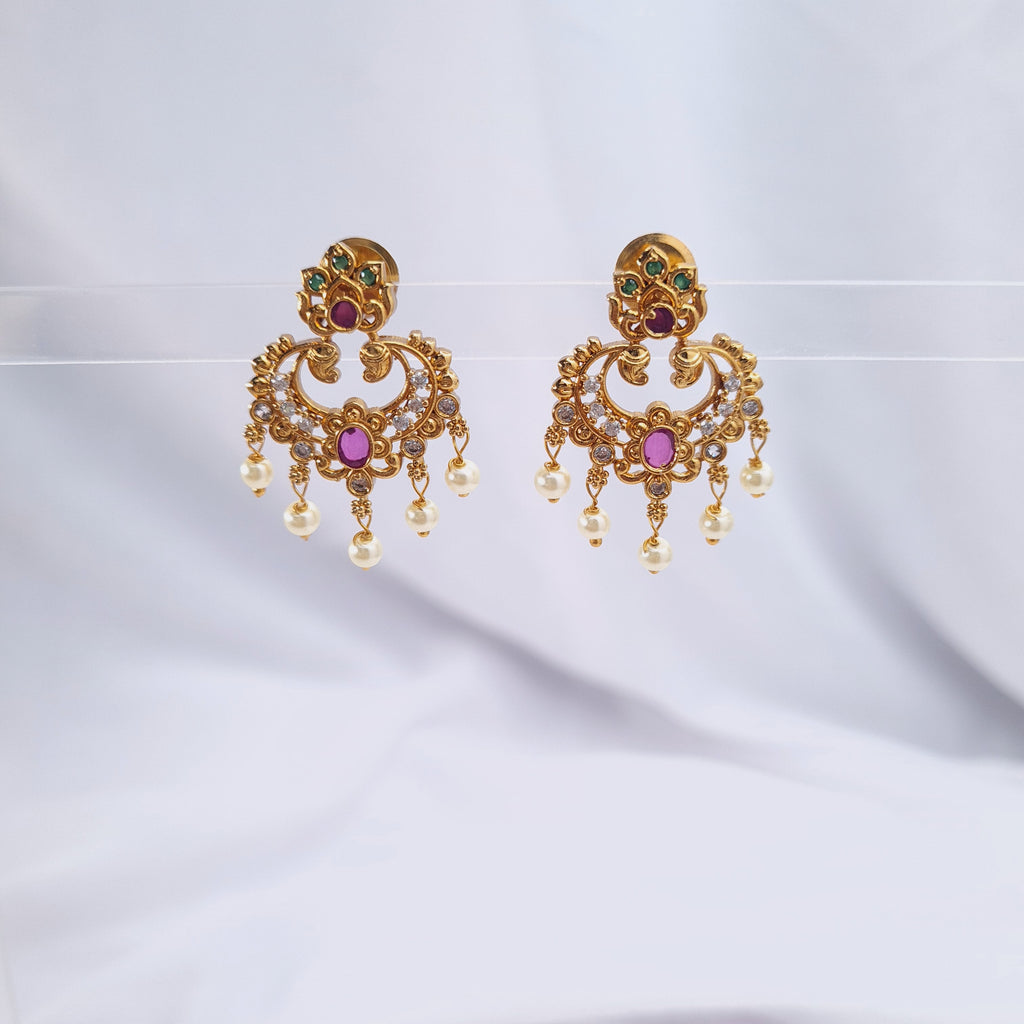 Antique gold-plated chandbali earrings with CZ stones and pearls

