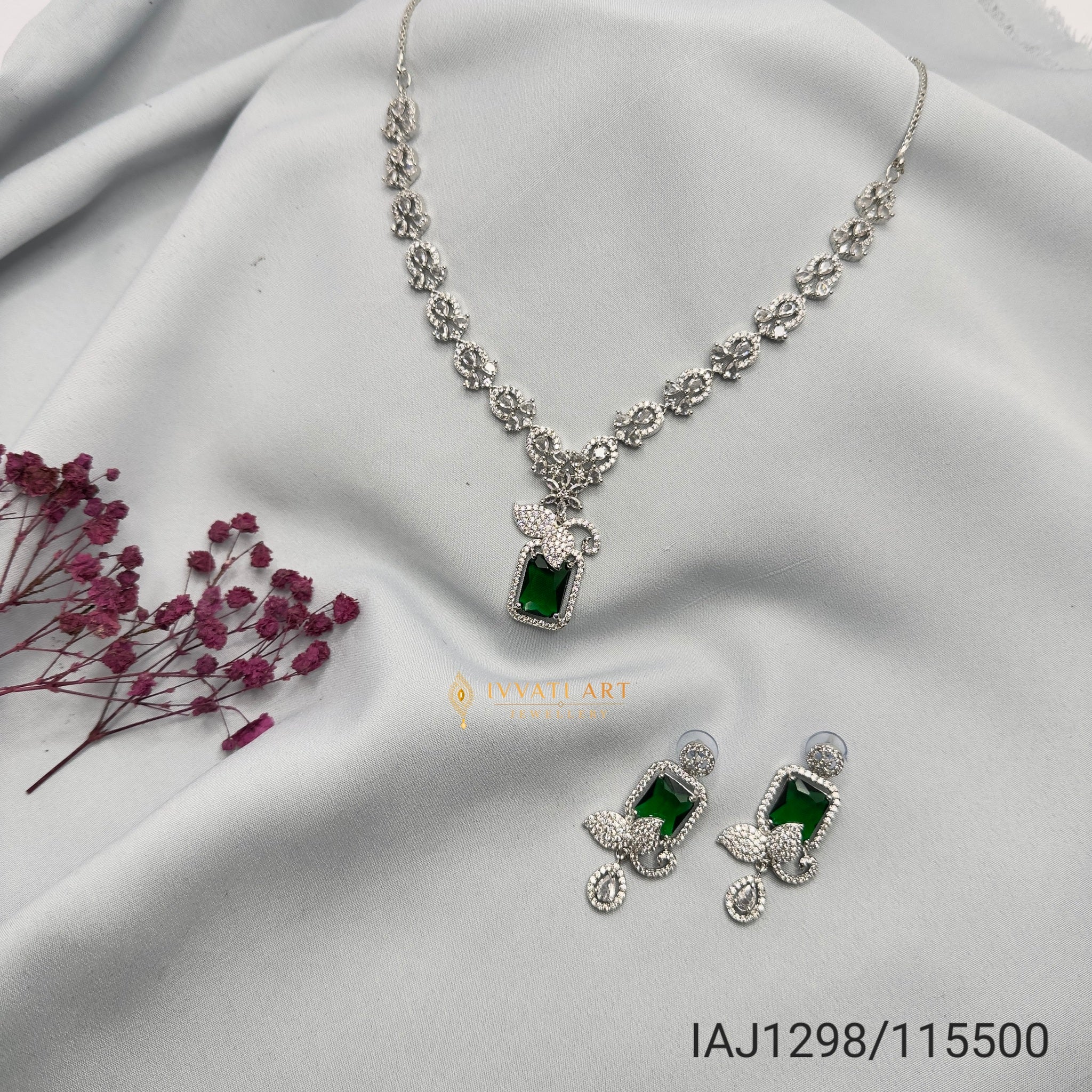 Emerald green stone necklace set with diamond-finish chain and earrings – handcrafted by Ivvati Art Jewellery.