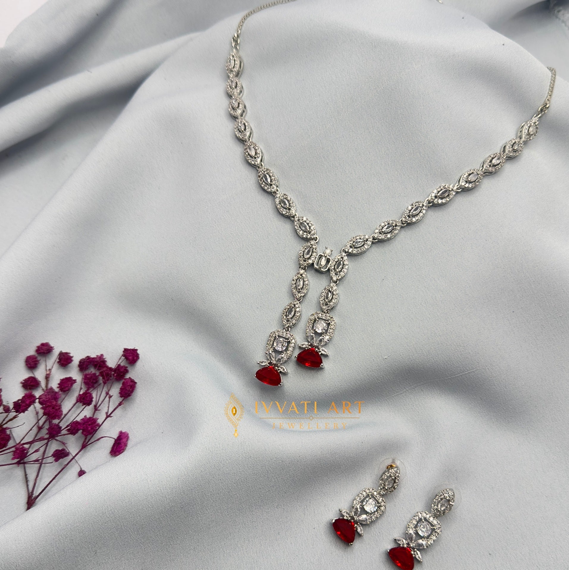 Emerald silver diamond necklace set with matching earrings – handcrafted festive jewellery by Ivvati Art Jewellery.