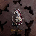 Antique gold Kundan nath with ruby cluster design, pearl detailing, and green crystal drops – handcrafted traditional jewellery by Ivvati Art Jewellery.