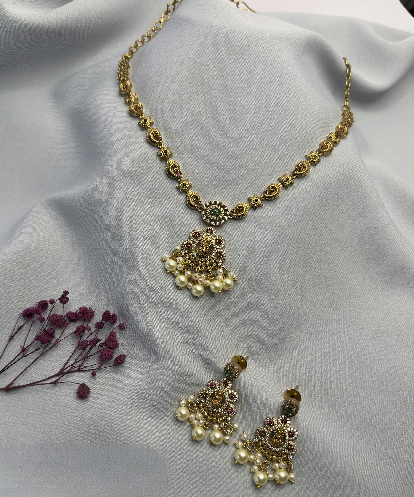 Golden temple charm necklace set with matching earrings and pearl drops – handcrafted Indian jewellery by Ivvati Art Jewellery.