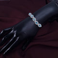 Turquoise blue CZ silver bracelet with oval stones 