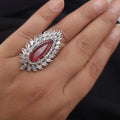 CZ ruby ring with diamond accents in silver finish