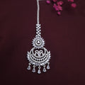Silver AD Maangtikka with sparkling American Diamonds on white background