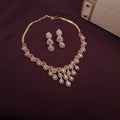Gold finish CZ necklace set with ruby and silver teardrop stones

