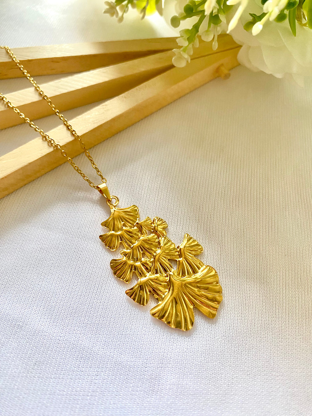 Gold ginkgo leaf pendant necklace with layered fan design – anti-tarnish 18K gold finish by Ivvati Art Jewellery

