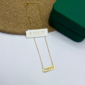 Gold oval bar pendant necklace with three sliding CZ stones – Ivvati Art Jewellery


