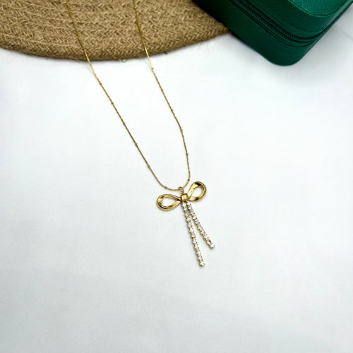 Gold bow-shaped necklace with diamond-studded detailing – Celestial Bow by Ivvati

