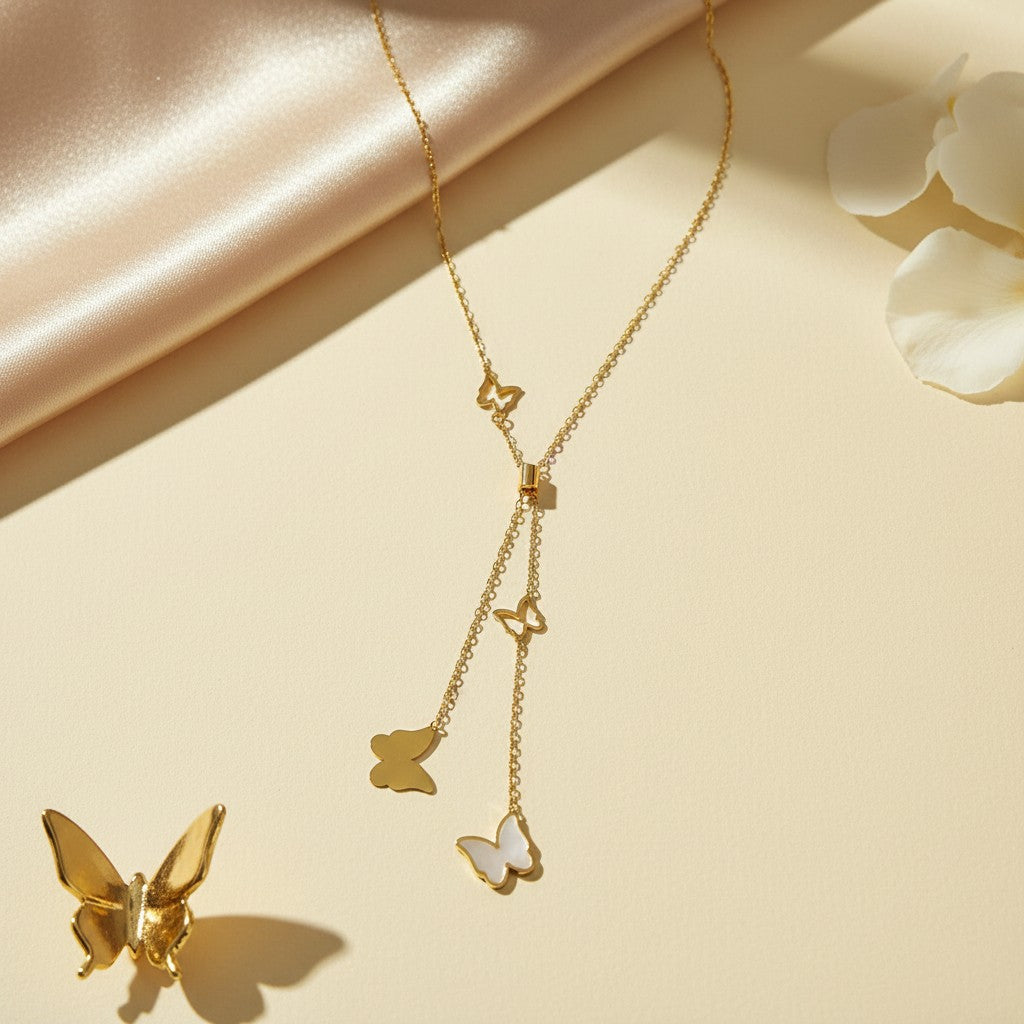 Gold butterfly lariat necklace for women with multiple butterfly charms | Ivvati demi-fine jewellery