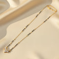 Daily wear mangalsutra for women with black beads and American Diamond cluster pendant | Ivvati Art Jewellery