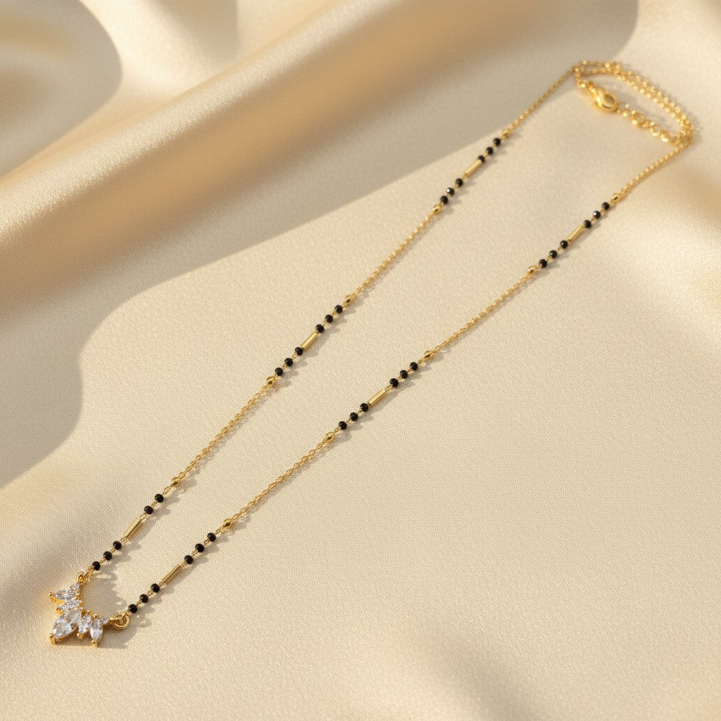 Daily wear mangalsutra for women with black beads and American Diamond cluster pendant | Ivvati Art Jewellery