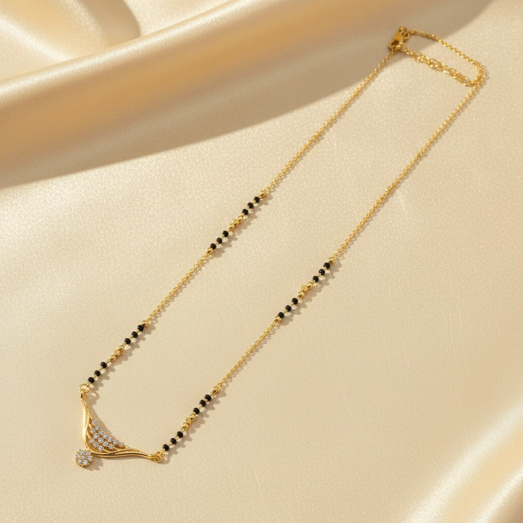 Daily wear mangalsutra for women with black beads and American Diamond curved pendant | Ivvati Art Jewellery