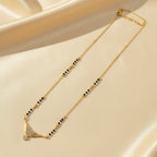 Daily wear mangalsutra for women with black beads and American Diamond curved pendant | Ivvati Art Jewellery