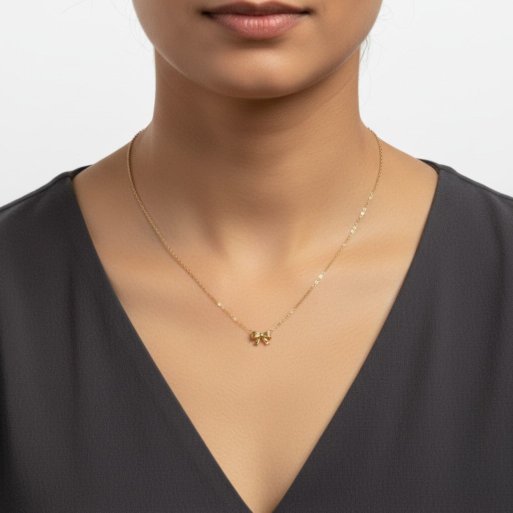 Gold bow pendant necklace for women | Ivvati demi-fine jewellery