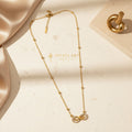 Gold infinity necklace for women with sparkling infinity pendant | Ivvati demi-fine jewellery