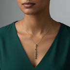 Long green stone pendant necklace for women with cascading green gemstone-style details