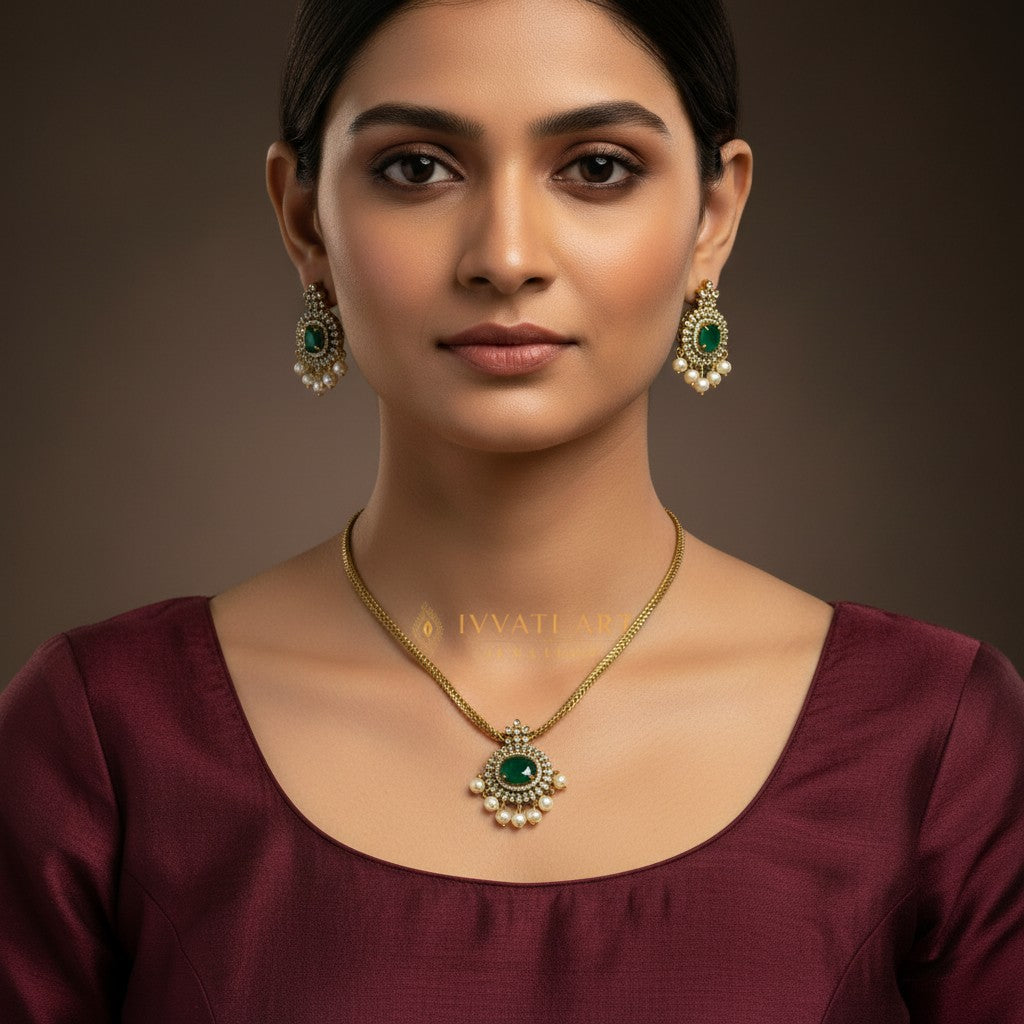 Traditional gold finish green stone pendant necklace with matching earrings for women