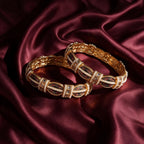 Ivvati Rajwadi Meenakari pearl bangle set with gold-tone finish and red green detailing