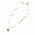 Demi-Fine gold-tone leaf pendant necklace by Ivvati