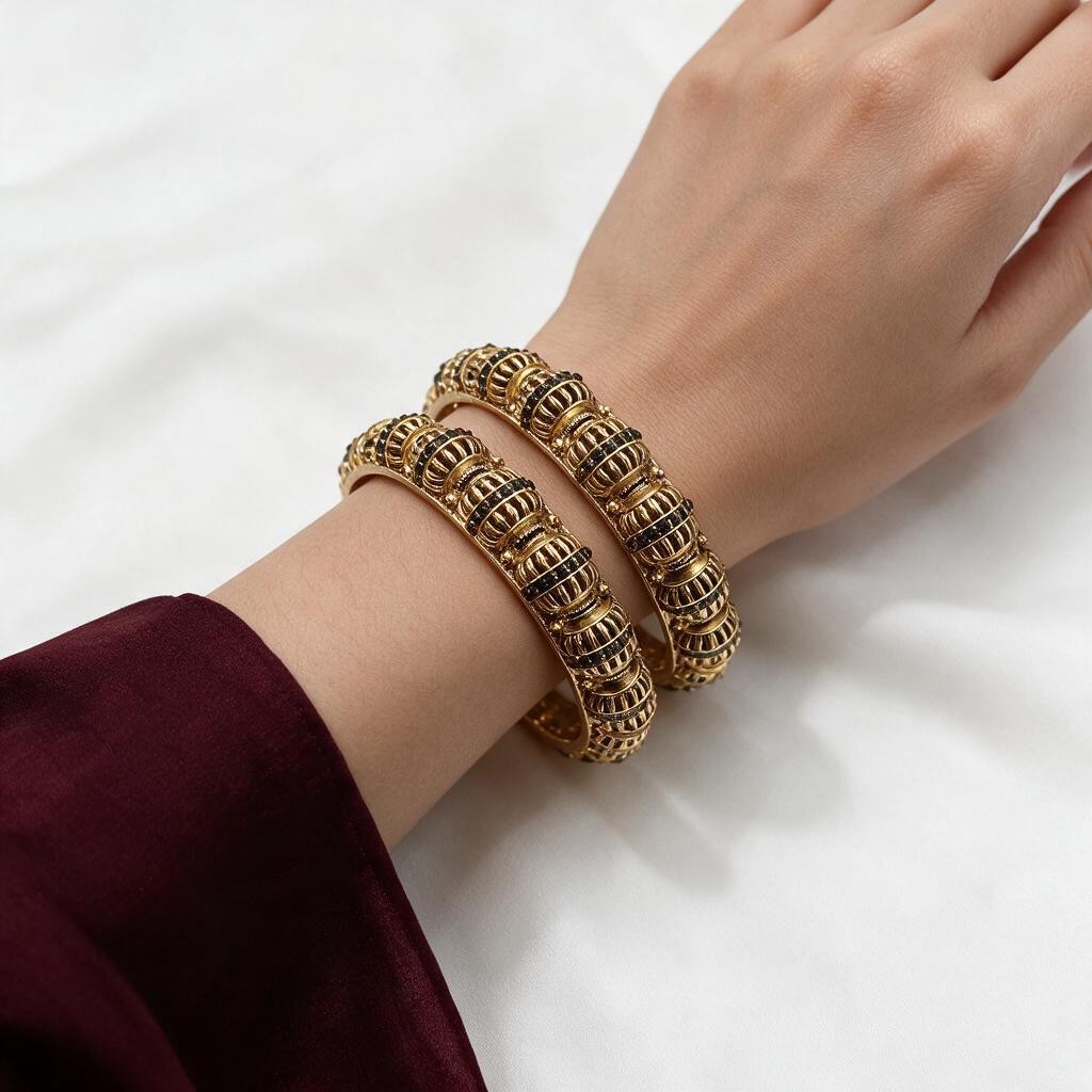 Ivvati gold-tone traditional bangles with detailed textured design