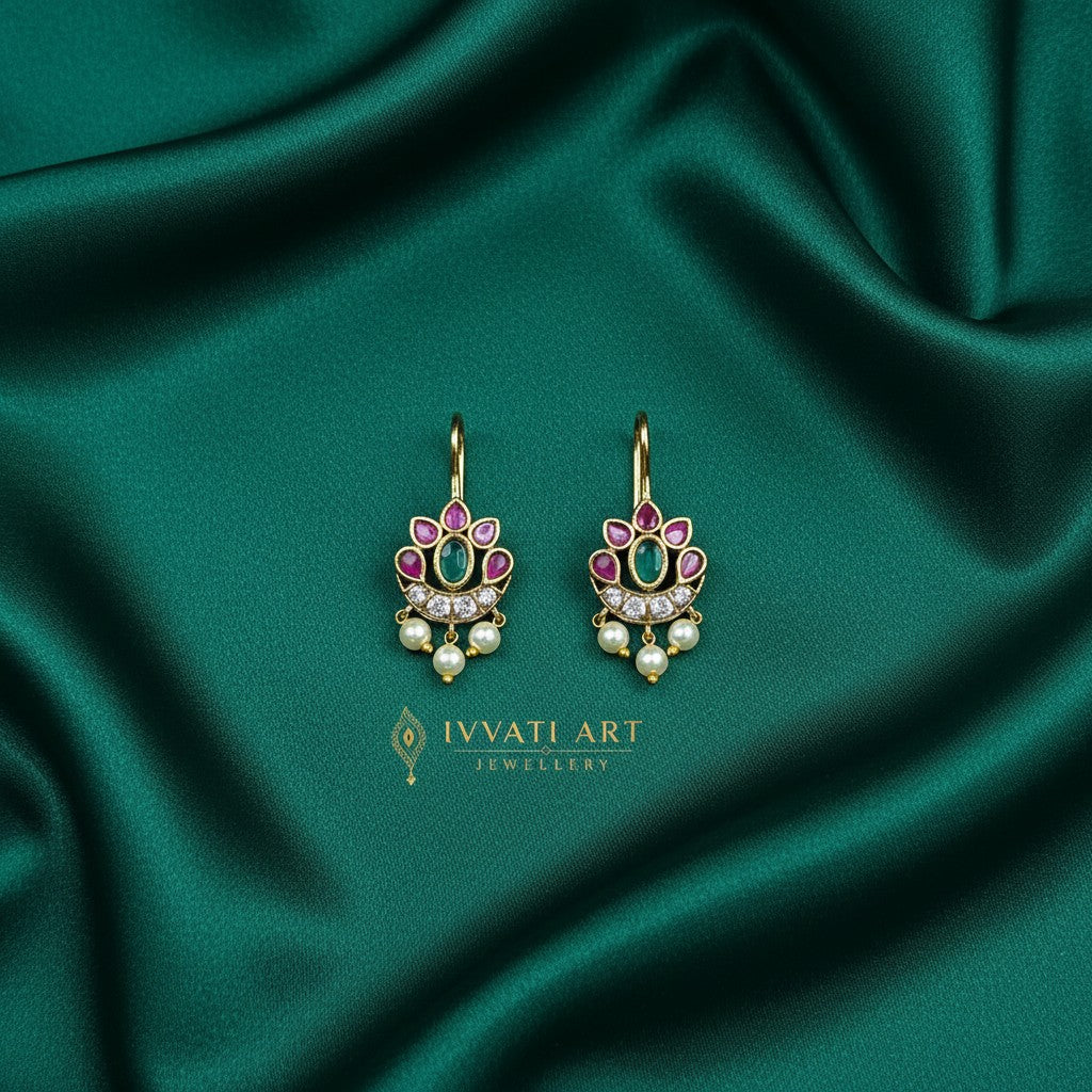 Ivvati pink and green floral Bugadi earrings with pearl drops and gold finish