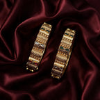 Ivvati Rajwadi gold-tone bangle set with red green and clear stone detailing