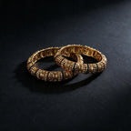 Ivvati traditional gold-tone bangle pair side view