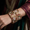 Ivvati traditional Rajwadi bangle set with red green stone accents