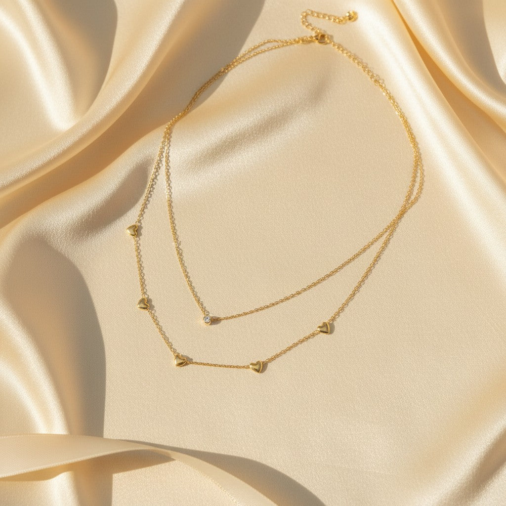 Layered heart necklace for women with delicate gold-tone chains and heart charms | Ivvati Art Jewellery