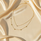 Layered heart necklace for women with delicate gold-tone chains and heart charms | Ivvati Art Jewellery