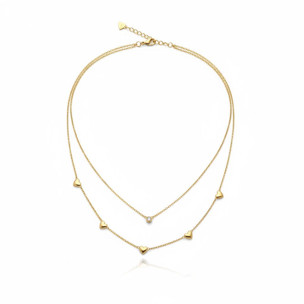 Minimal gold heart necklace with layered chains and heart accents for women | Ivvati Art Jewellery