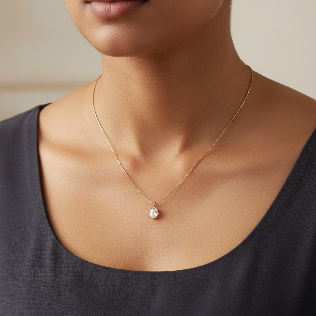 Minimalist gold pendant necklace with oval clear stone for women