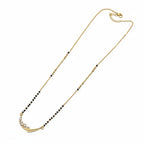 Modern black bead mangalsutra featuring an elegant curved CZ stone pendant | Ivvati Art Jewellery