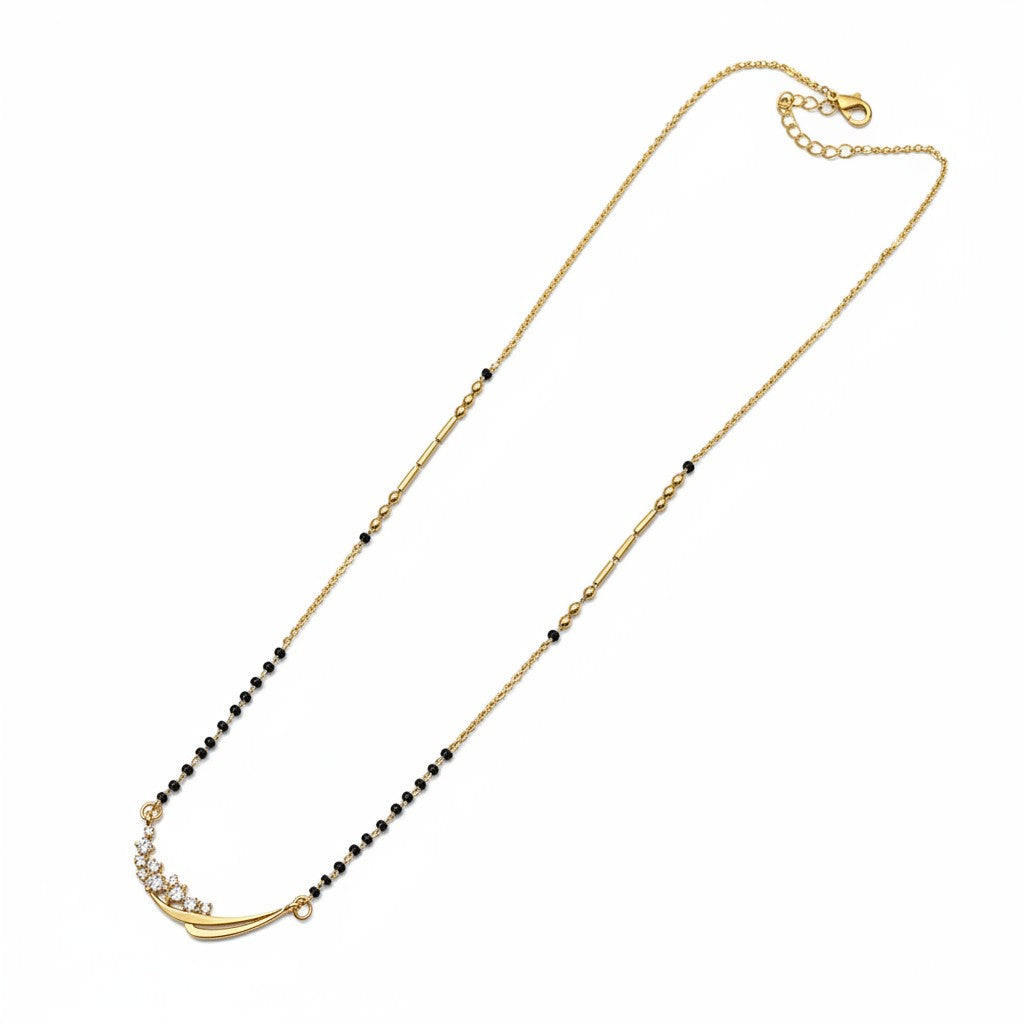 Modern black bead mangalsutra featuring an elegant curved CZ stone pendant | Ivvati Art Jewellery