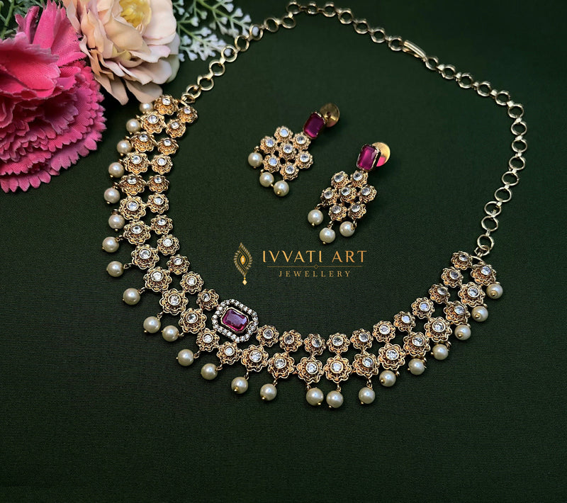 Kundan choker necklace set with ruby stone and pearl drops for bridal wear