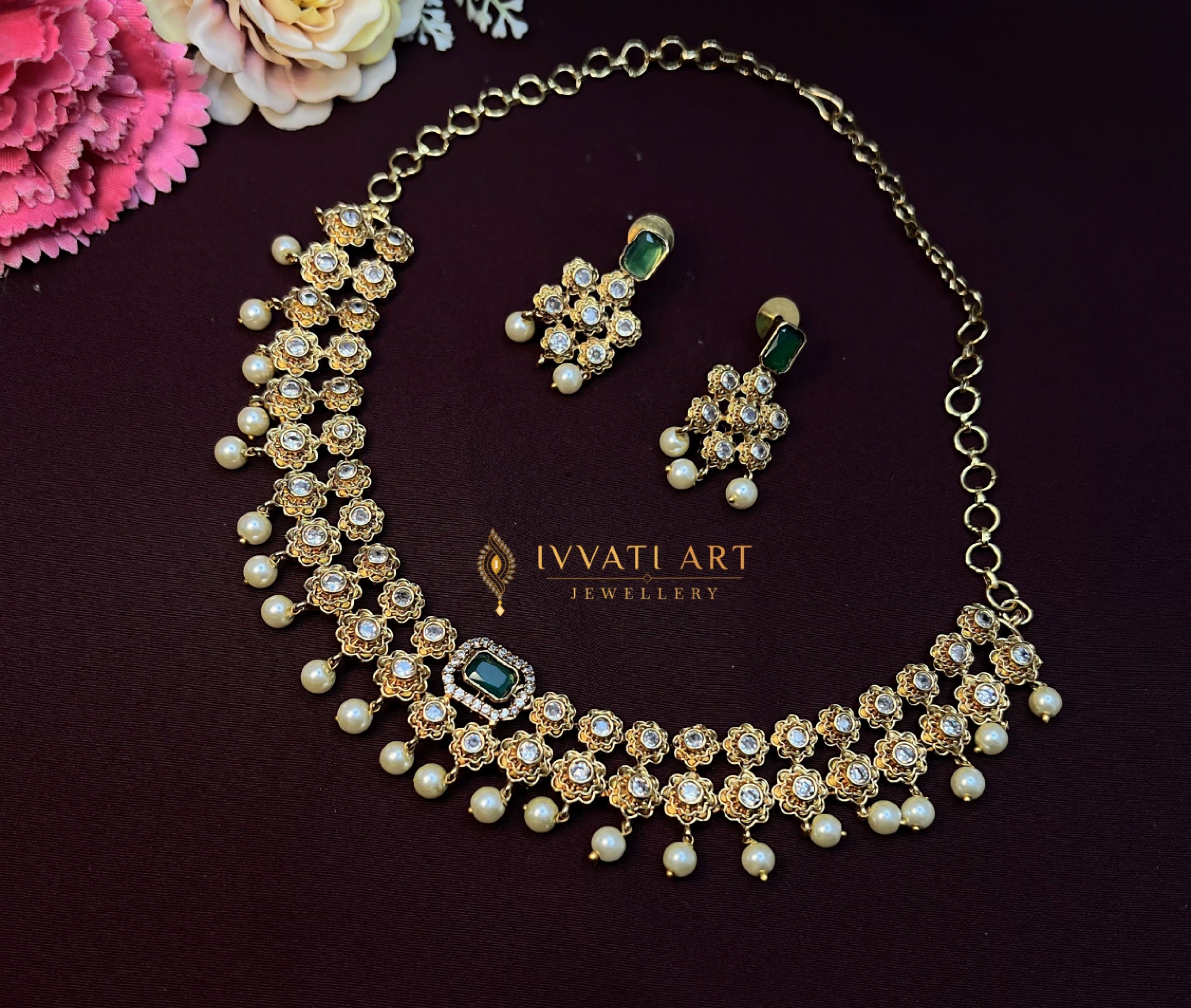 kundan floral pearl drop necklace set with emerald centerpiece indian jewellery