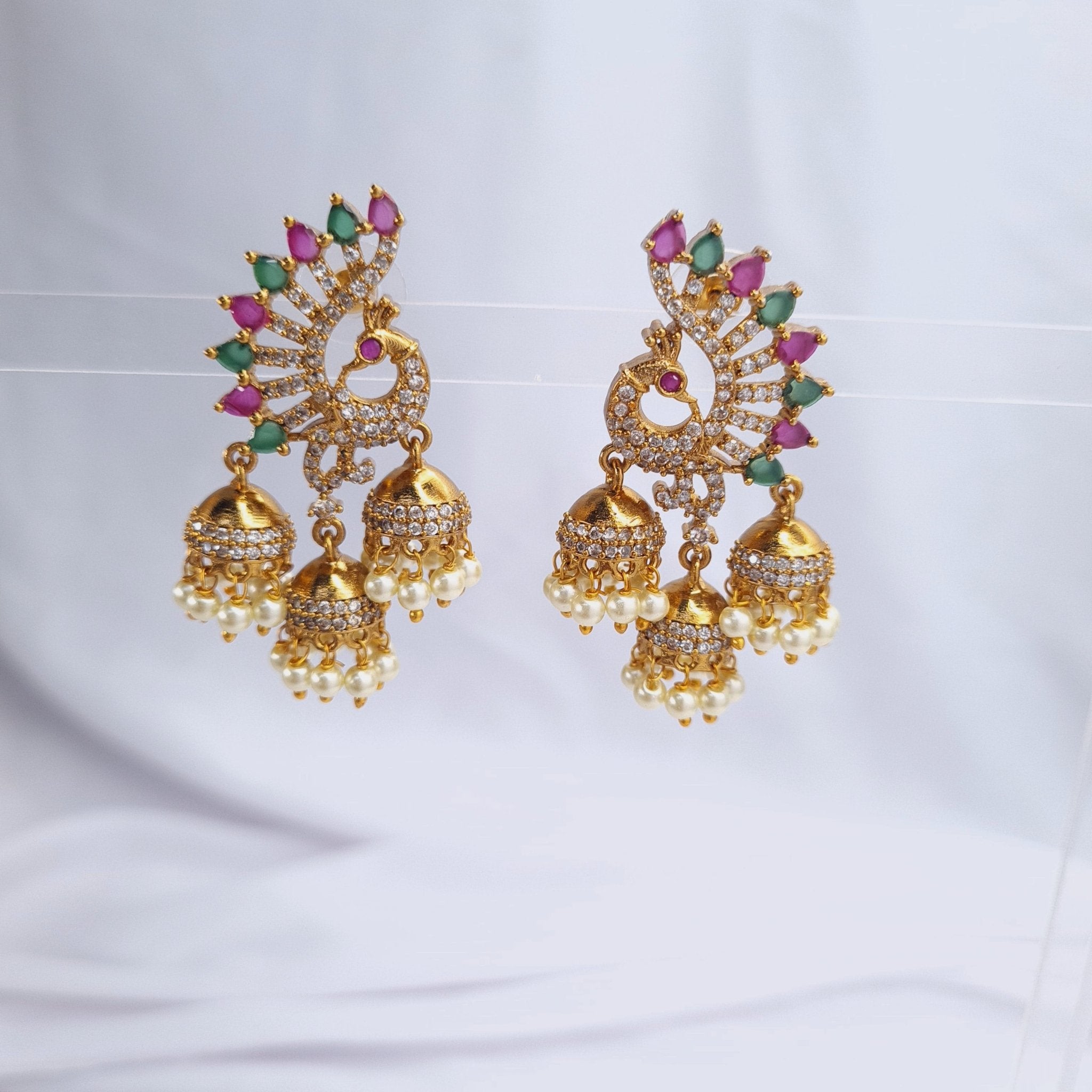 Peacock CZ Gold - Plated Triple Jhumka Earrings jewellery - Jhumka | Ivvati Art Jewellery