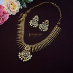 Temple spike necklace set with kundan stones and pearl drops in antique gold finish