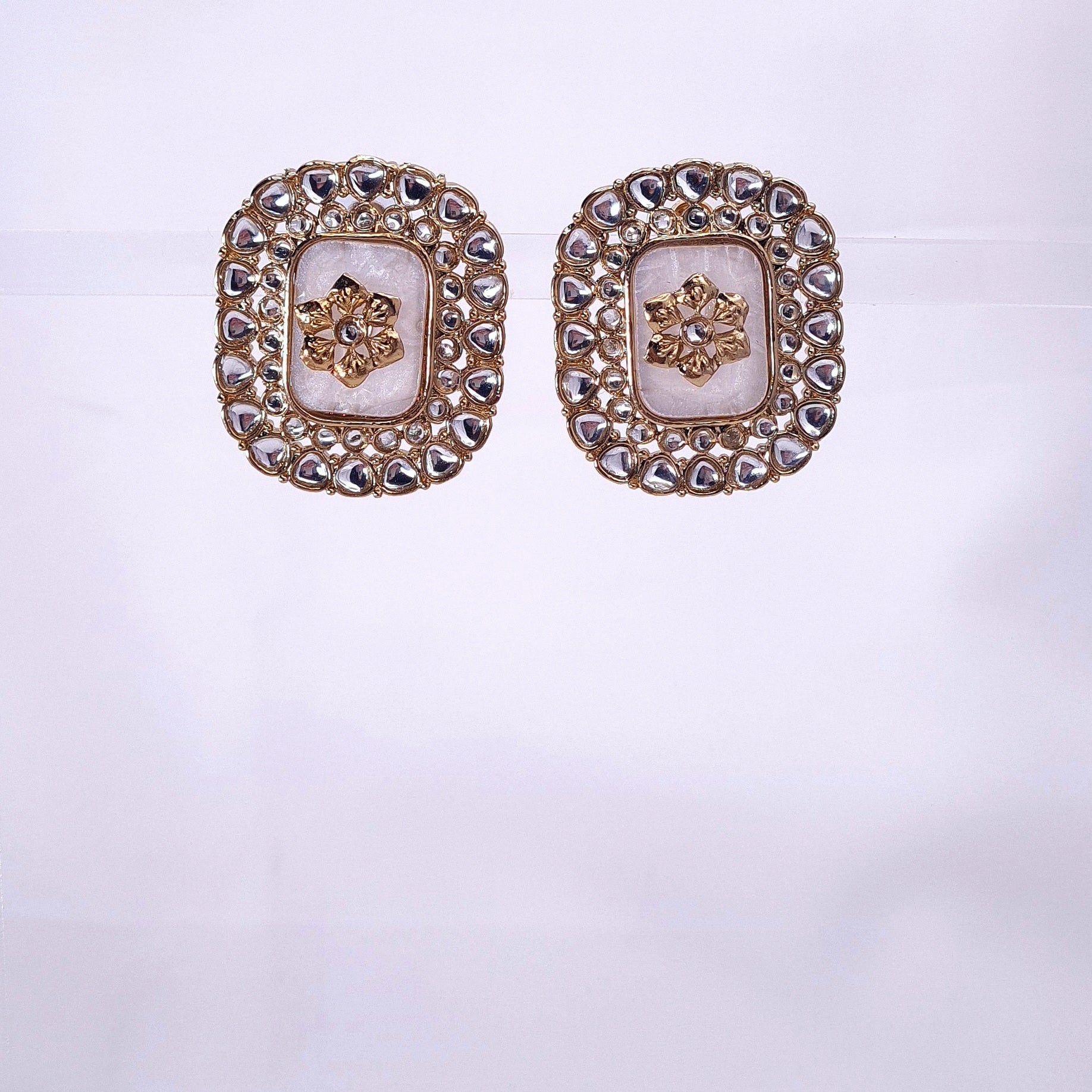 Regal Polki Stud Earrings with Floral Motif jewellery - Earrings | Ivvati Art Jewellery