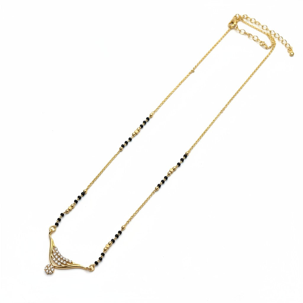 Simple modern daily wear mangalsutra with black beads and gold-tone American Diamond pendant | Ivvati Art Jewellery